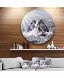 Design Art Art 'Woman With Dark Angel Wings' Beach Metal Circle Wall Art - 36 X 36