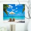 Design Art Art 'Turquoise Beach With Chairs' Seashore Photo Metal Wall Art - 20 X 12